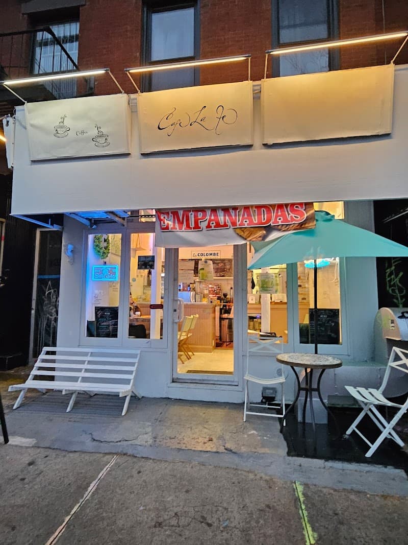 Café La Fe storefront at dusk
